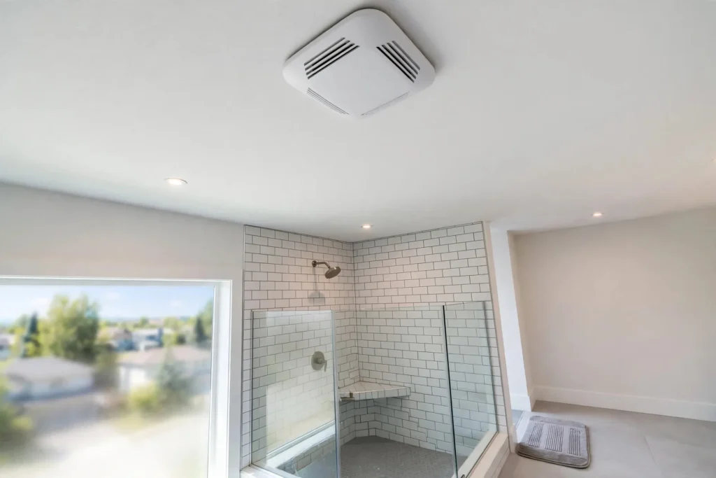 bathroom exhaust fan installation cost BC — new quiet exhaust fan installed in the ceiling of a BC home bathroom